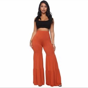Sold! NWOT Rust Flare Pants